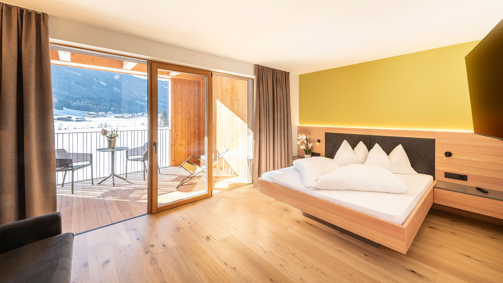 a comfortable room of the Hotel Tyrol in Gsies