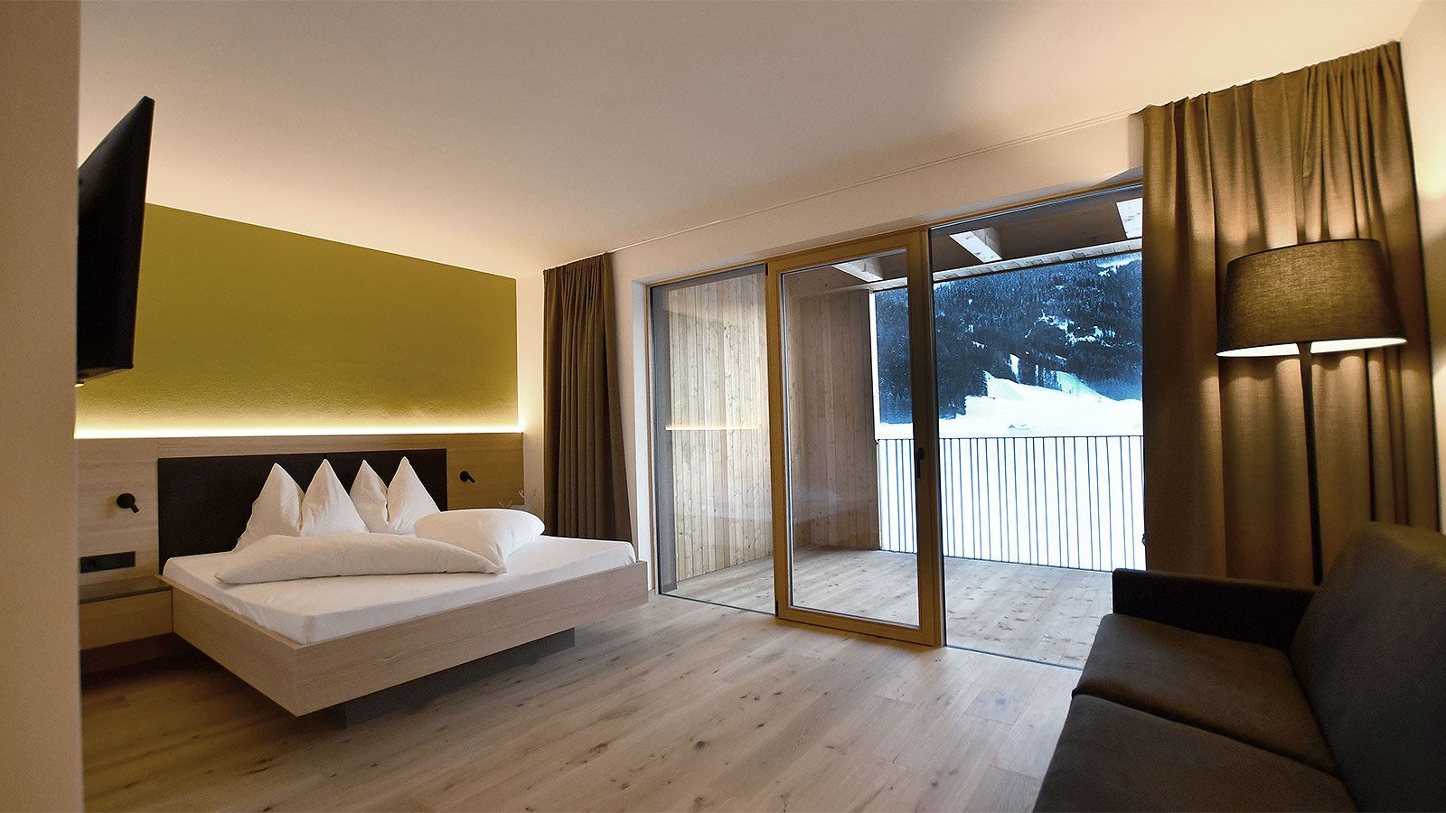 a comfortable room of the Hotel Tyrol in Gsies