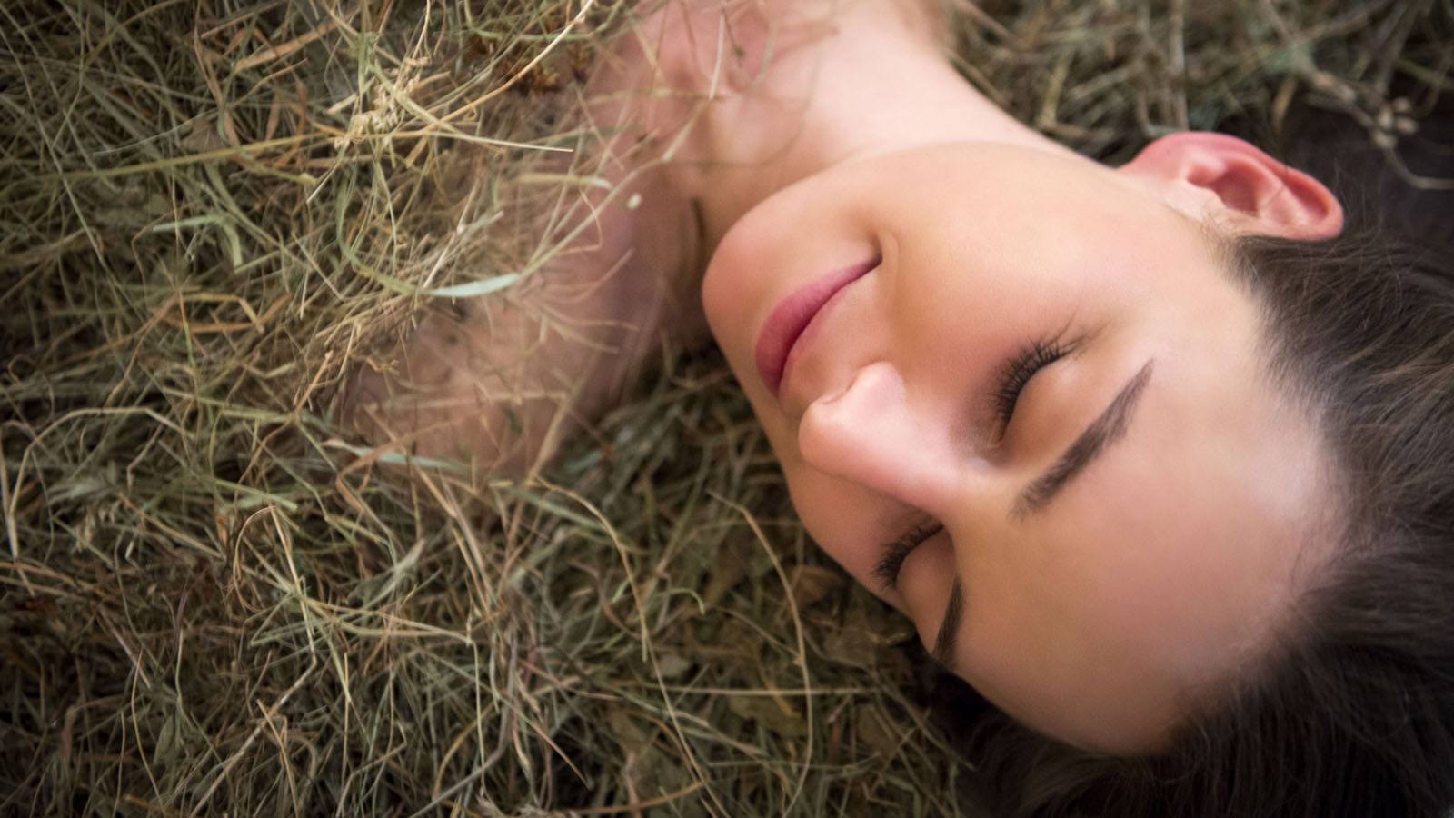 a lady during a hay bath